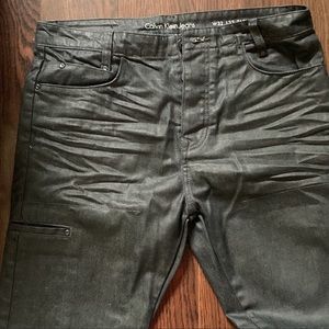 Calvin Klein black Metallic Coated Jeans. Size 32